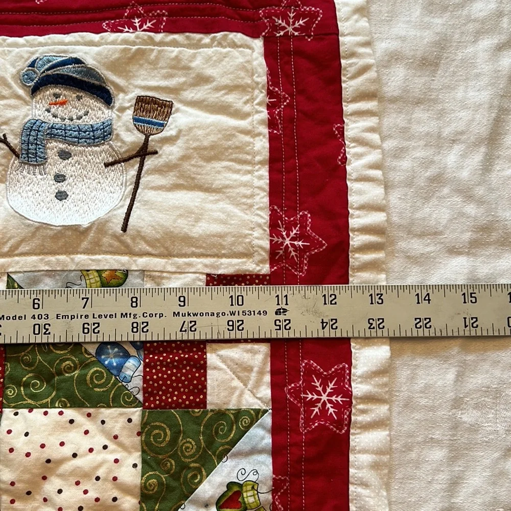 Vintage handmade snowman quilt hanging